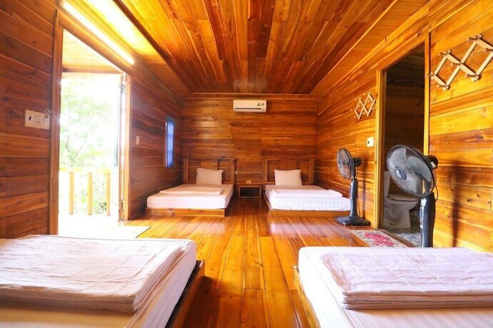 Imagen de la habitación del Hotel Cô Tô Village. Foto 18