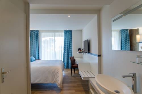 Imagen de la habitación del Hotel C&ocirc;t&eacute; Thalasso Banyuls Sur Mer. Foto 9