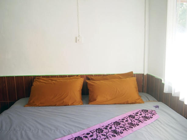 Imagen de la habitación del Hotel Coco Beach Bungalows. Foto 7
