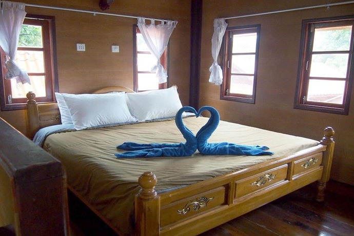 Imagen de la habitación del Hotel Coco Beach Bungalows. Foto 14