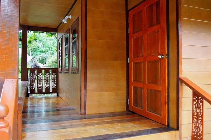 Imagen de la habitación del Hotel Coco Beach Bungalows. Foto 15