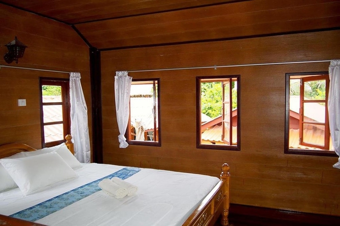 Imagen de la habitación del Hotel Coco Beach Bungalows. Foto 16