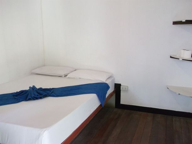 Imagen de la habitación del Hotel Coco Garden Resort. Foto 9