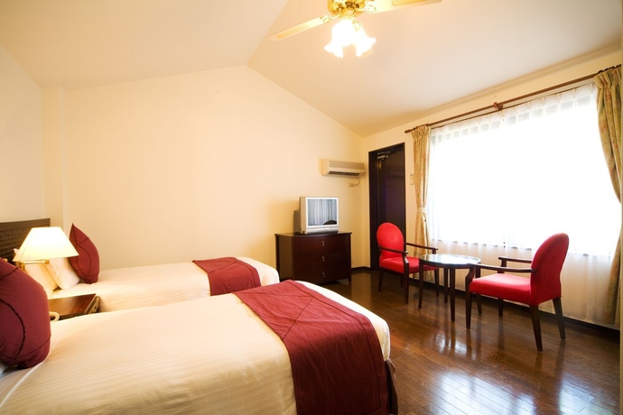 Imagen de la habitación del Hotel Coco Garden Resort Okinawa. Foto 4