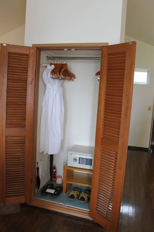 Imagen de la habitación del Hotel Coco Garden Resort Okinawa. Foto 5