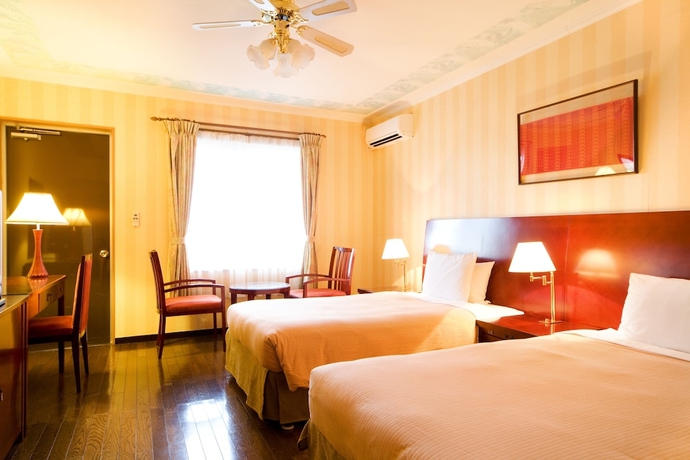 Imagen de la habitación del Hotel Coco Garden Resort Okinawa. Foto 6