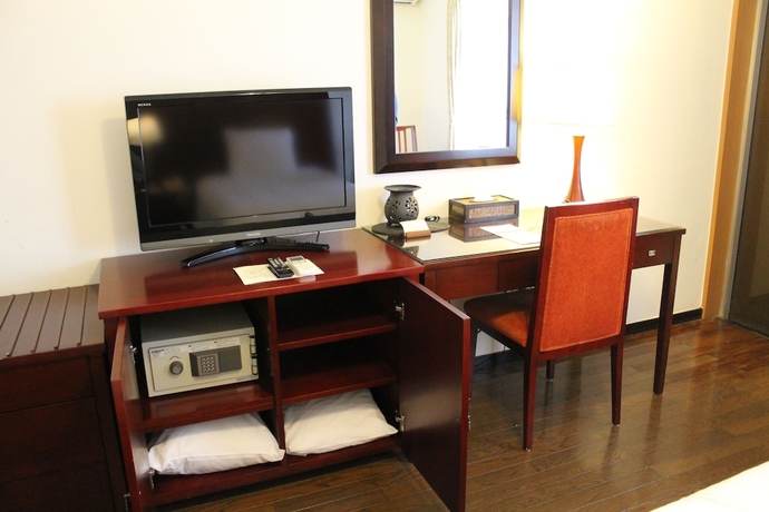 Imagen de la habitación del Hotel Coco Garden Resort Okinawa. Foto 8