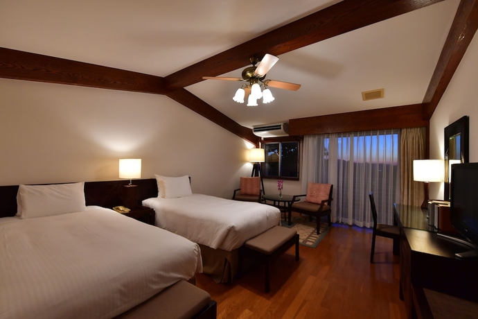 Imagen de la habitación del Hotel Coco Garden Resort Okinawa. Foto 11