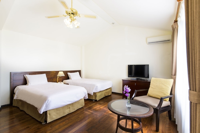 Imagen de la habitación del Hotel Coco Garden Resort Okinawa. Foto 14