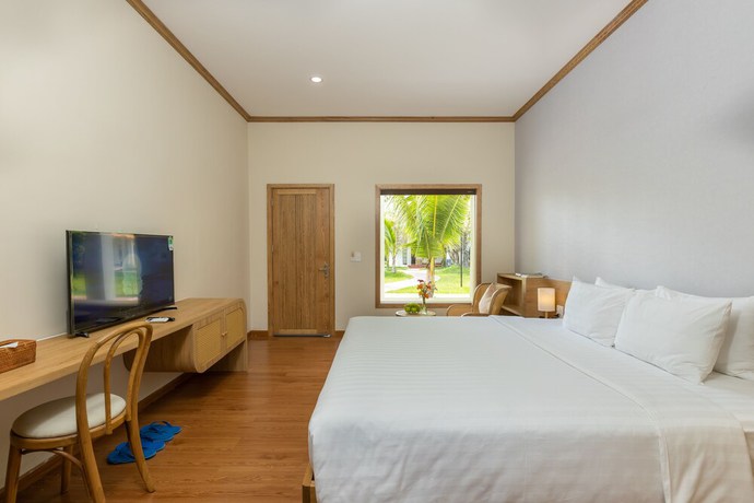Imagen de la habitación del Hotel Coco Garden Resort Phu Quoc. Foto 9