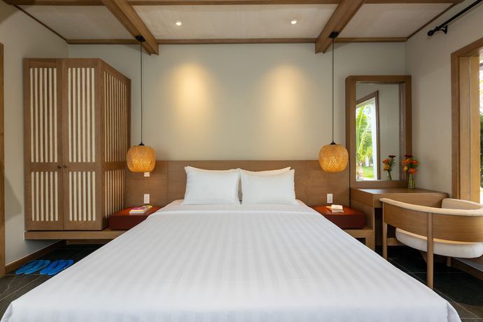 Imagen de la habitación del Hotel Coco Garden Resort Phu Quoc. Foto 12