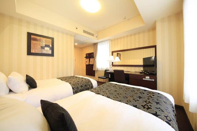 Imagen de la habitación del Hotel Coco Grand Kitasenju. Foto 12