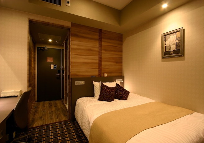 Imagen de la habitación del Hotel Coco Grand Takasaki. Foto 2