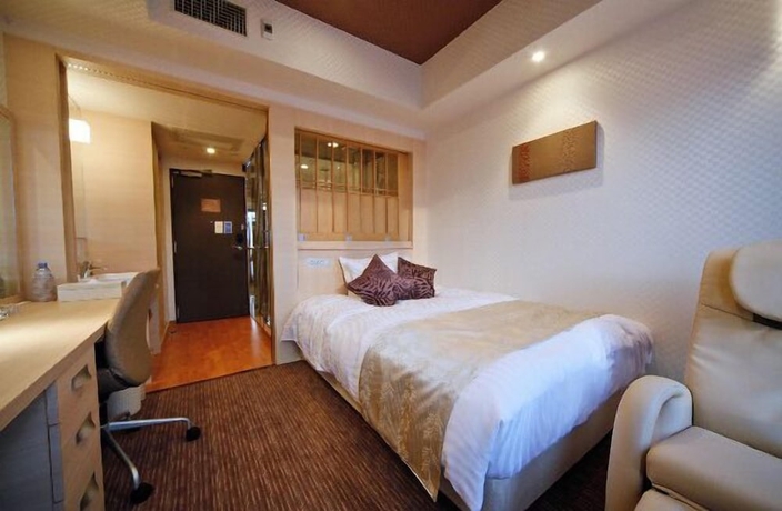 Imagen de la habitación del Hotel Coco Grand Takasaki. Foto 3