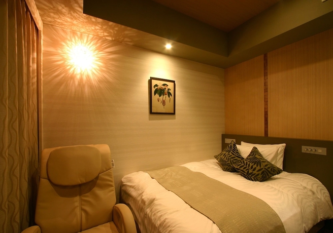 Imagen de la habitación del Hotel Coco Grand Takasaki. Foto 10