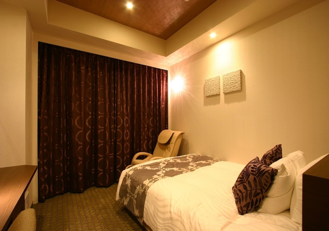 Imagen de la habitación del Hotel Coco Grand Takasaki. Foto 12