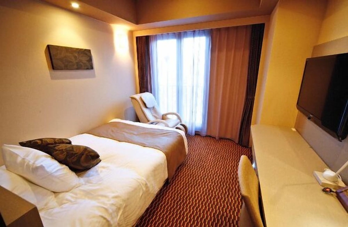 Imagen de la habitación del Hotel Coco Grand Takasaki. Foto 15