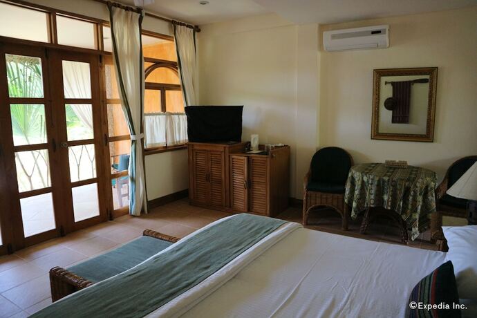 Imagen de la habitación del Hotel Coco Grove Beach Resort. Foto 30