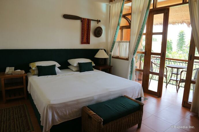 Imagen de la habitación del Hotel Coco Grove Beach Resort. Foto 37