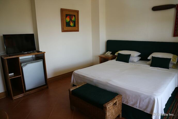 Imagen de la habitación del Hotel Coco Grove Beach Resort. Foto 38