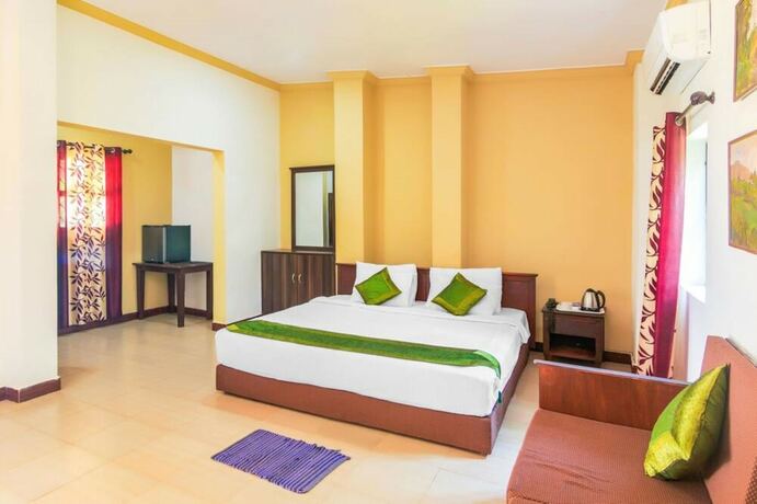 Imagen de la habitación del Hotel Coco Heritage Resort. Foto 18