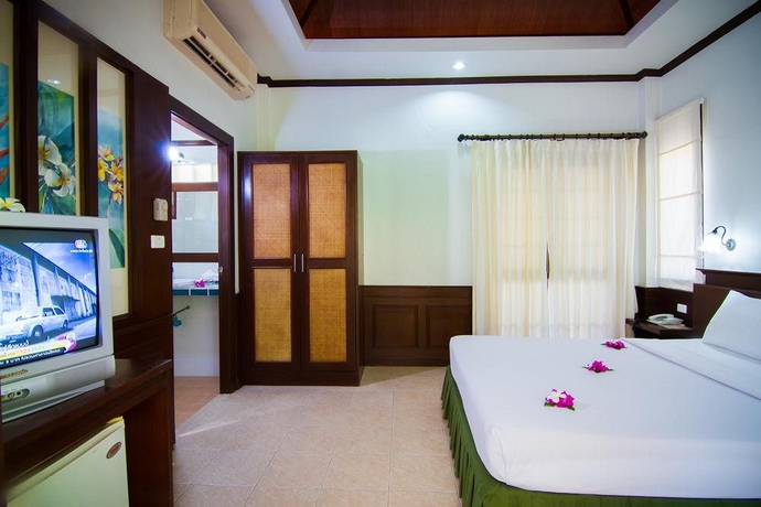 Imagen de la habitación del Hotel Coco Palm Beach Resort. Foto 7