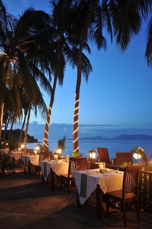 Imagen del bar/restaurante del Hotel Coco Palm Beach Resort. Foto 4