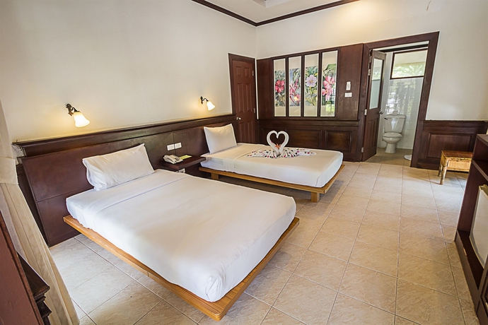 Imagen de la habitación del Hotel Coco Palm Beach Resort. Foto 9