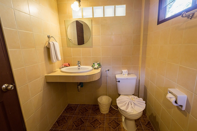 Imagen de la habitación del Hotel Coco Palm Beach Resort. Foto 10