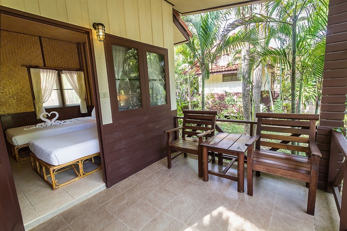 Imagen de la habitación del Hotel Coco Palm Beach Resort. Foto 11