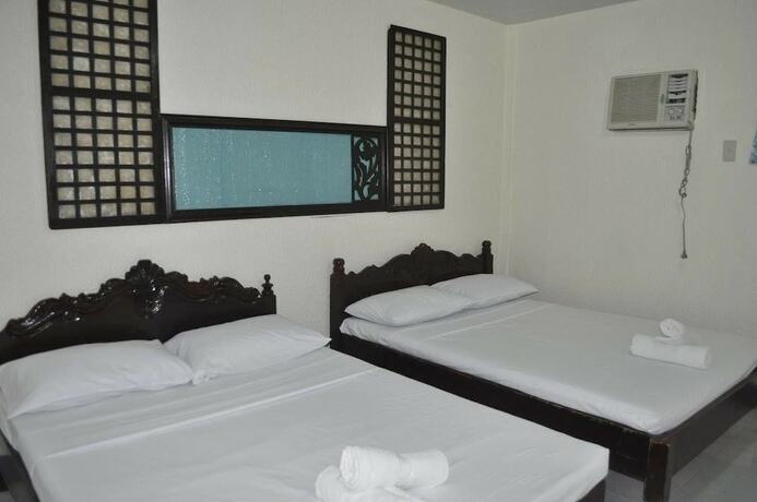 Imagen de la habitación del Hotel Coco Paradise Beach Resort. Foto 15