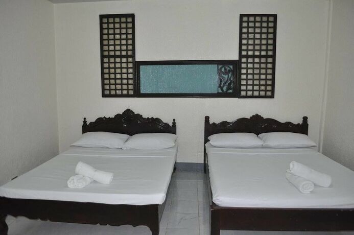 Imagen de la habitación del Hotel Coco Paradise Beach Resort. Foto 16