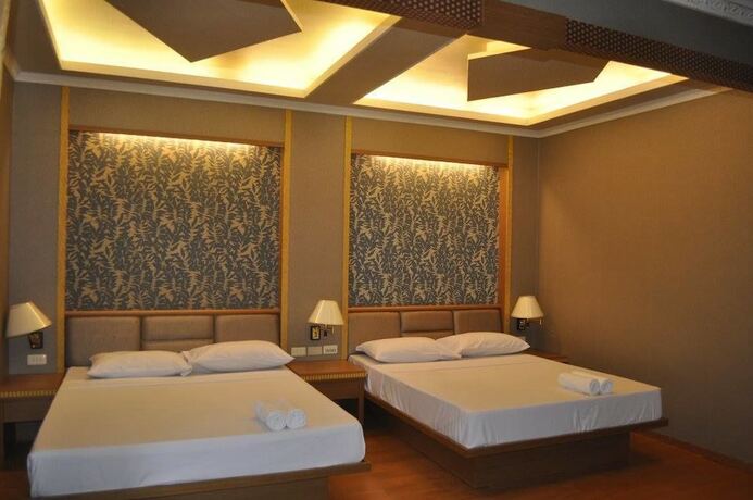 Imagen de la habitación del Hotel Coco Paradise Beach Resort. Foto 17