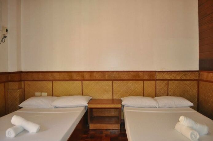 Imagen de la habitación del Hotel Coco Paradise Beach Resort. Foto 20