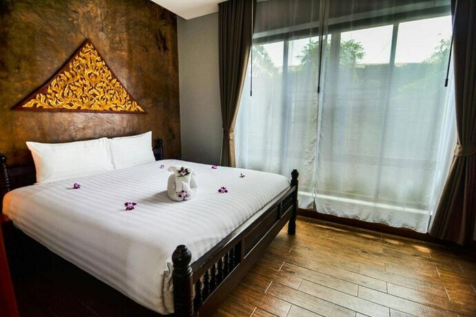 Imagen de la habitación del Hotel Coco Paradiso Phuket. Foto 14