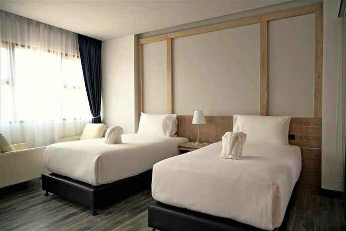 Imagen de la habitación del Hotel Coco Paradiso Phuket. Foto 16