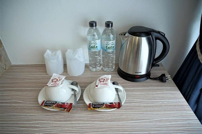 Imagen de la habitación del Hotel Coco Paradiso Phuket. Foto 19