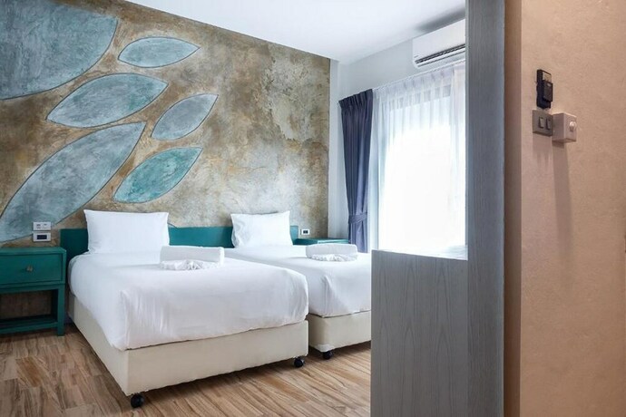 Imagen de la habitación del Hotel Coco Paradiso Phuket. Foto 28