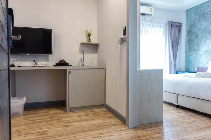 Imagen de la habitación del Hotel Coco Paradiso Phuket. Foto 32