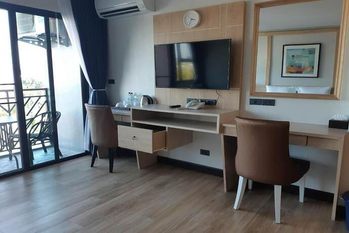 Imagen de la habitación del Hotel Coco Paradiso Phuket. Foto 34