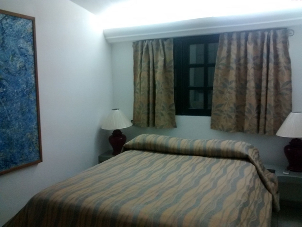 Imagen de la habitación del Hotel Coco Plaza. Foto 14