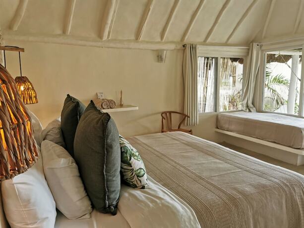 Imagen de la habitación del Hotel Coco Unlimited. Foto 17