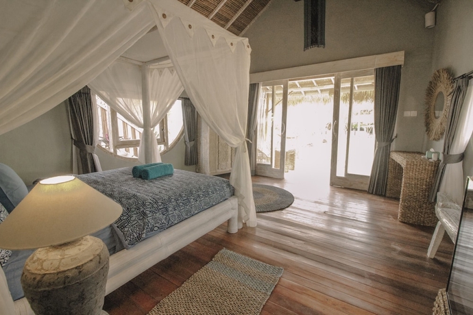 Imagen de la habitación del Hotel Coco Verde Bali Resort. Foto 6