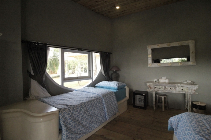 Imagen de la habitación del Hotel Coco Verde Bali Resort. Foto 9