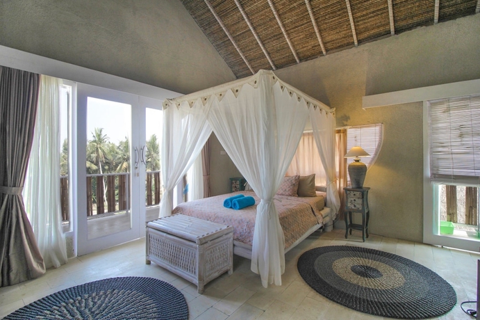 Imagen de la habitación del Hotel Coco Verde Bali Resort. Foto 10