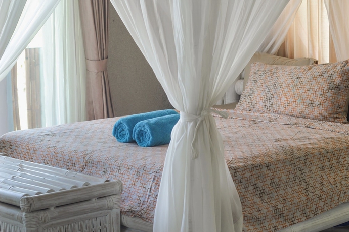 Imagen de la habitación del Hotel Coco Verde Bali Resort. Foto 11