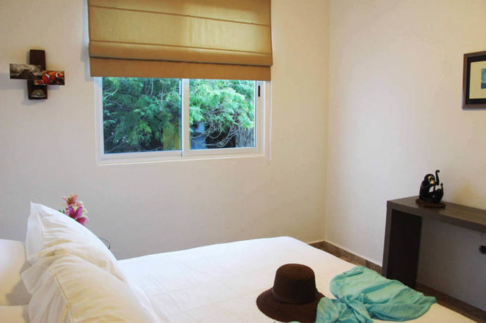 Imagen de la habitación del Hotel Coco Village. Foto 6