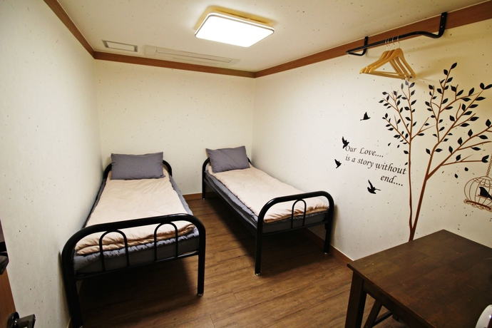 Imagen de la habitación del Hotel Cocoa Guesthouse. Foto 12