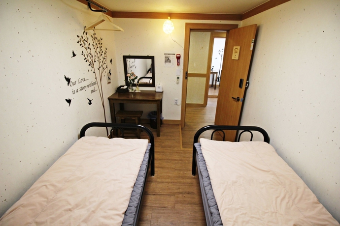 Imagen de la habitación del Hotel Cocoa Guesthouse. Foto 13