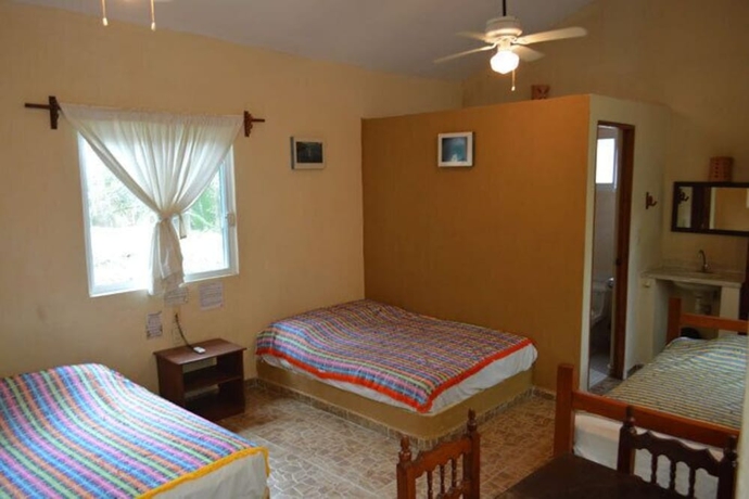 Imagen de la habitación del Hotel Cocoaventura Cabanas Y Club De Playa - Campsite. Foto 12